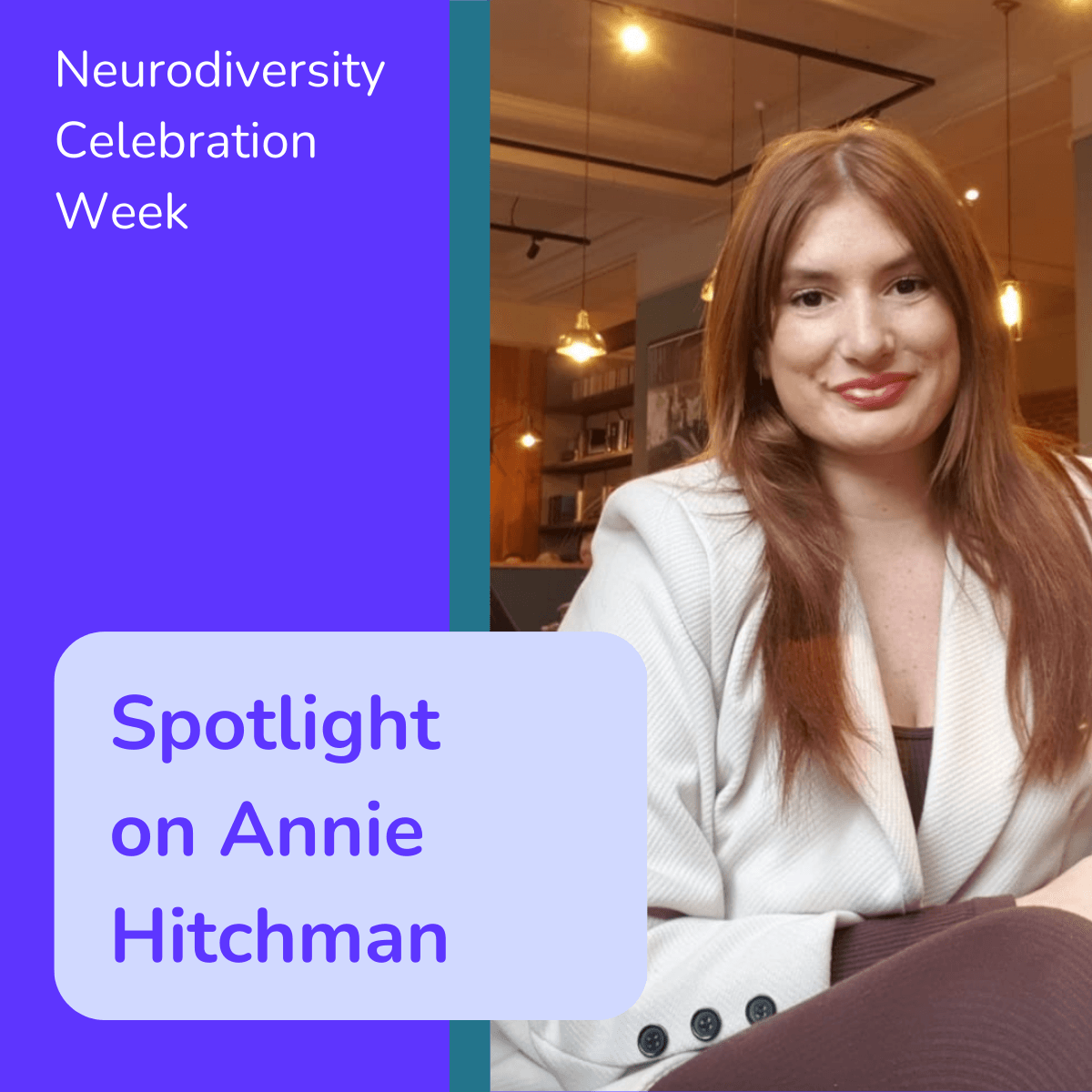 Spotlight on Annie Hitchman - Annie is a woman with long red hair sitting smiling at the camera, she wears a white blazer and brown trousers