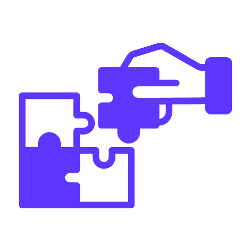 A hand putting the final piece of a puzzle into a puzzle