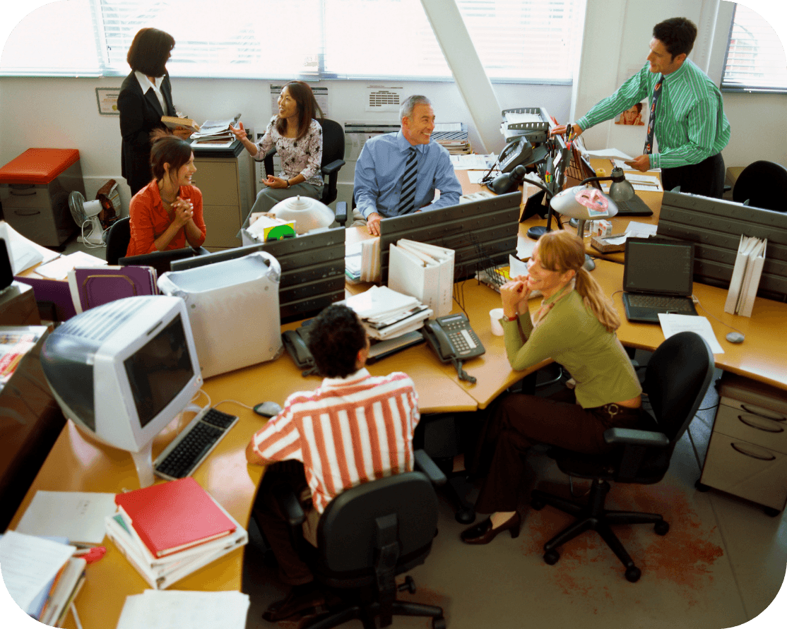 various office workers within a brightly coloured office space